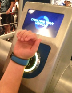 Using MagicBands just before entering the ride vehicle at Test Track to bring up the car design customized earlier.